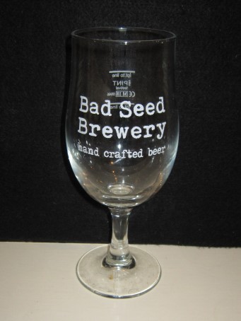 beer glass from the Bad Seed  brewery in England with the inscription 'Bad Seed Brewery, Hand Crafted Beer'