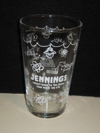 beer glass from the Jennings brewery in England with the inscription 'Jennings Thers's More To The Lakes Than Meets The Eye, Atomic Thery, Fine Line'