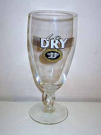 beer glass from the Pelican-Pelforth brewery in France with the inscription 'La Dry 33, Beer.Biere.Bier.Birra. Beer.Biere.Bier.Birra. '