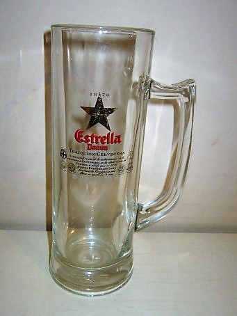 beer glass from the Damm brewery in Spain with the inscription '1876 Estrella Damm Tradicion Cervecera'