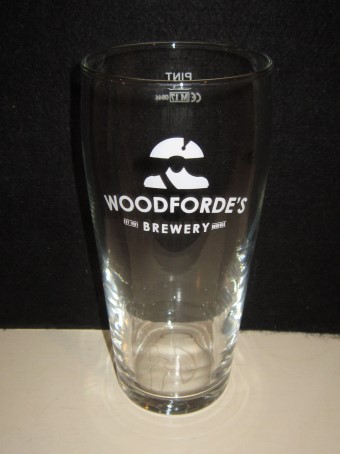beer glass from the Woodforde's  brewery in England with the inscription 'Woodforde's Brewery EST 1981 Norfolk'