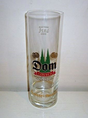 beer glass from the Dom  brewery in Germany with the inscription 'Dom Kolsch'