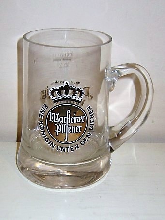 beer glass from the Warsteiner brewery in Germany with the inscription 'Warsteiner Pilsener Eine Konigin Unter Den Bieren'