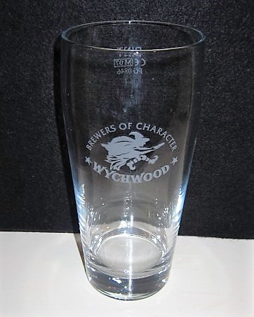 beer glass from the Wychwood  brewery in England with the inscription 'Brewers Of Character Wychwood'