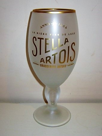 beer glass from the Stella Artois brewery in Belgium with the inscription 'Anno 1366 Stella Artois La Biere Fine De Luxe Leuven-Brasseries Artois-Louvain'