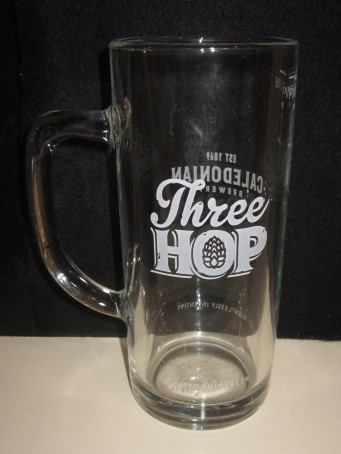 beer glass from the Caledonian  brewery in Scotland with the inscription 'Three Hop Caledonian Beer'