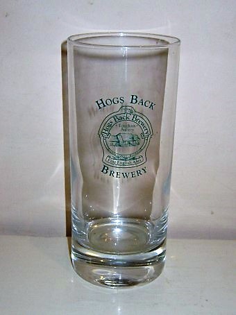 beer glass from the Hogs Back brewery in England with the inscription 'Hogs Back Brewery, Hogs Back Brewery Tongham Surry Fine English Ales Indeprndent Brewers'