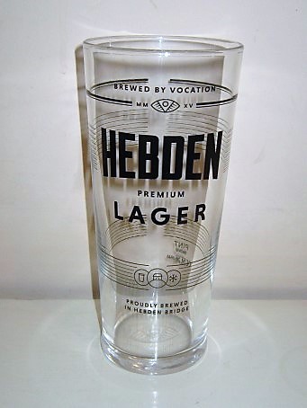 beer glass from the Vocation brewery in England with the inscription 'Hebden Premium Lager Brewed By Vocation MMXV'