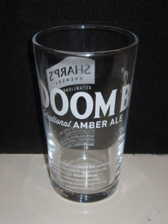 beer glass from the Sharp's brewery in England with the inscription 'Doombar Exceptional Amber Ale'