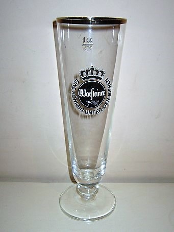 beer glass from the Warsteiner brewery in Germany with the inscription 'Warsteiner premium Verum Eine Konigin Unter Den Bieren'