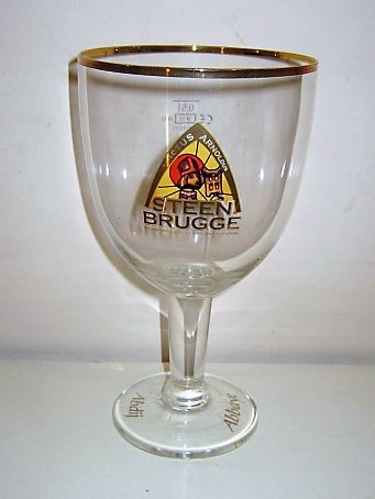 beer glass from the Palm brewery in Belgium with the inscription 'Steen Brugge Sanctus Arnoldus, St Pieters Abdij Abbaye St Pierre'