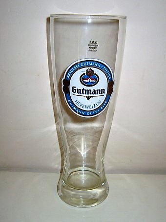 beer glass from the Gutmann  brewery in Germany with the inscription 'Gutmann Hefeweizen Seit 1707 Brauerei Gutmann Titting Gutmann Gutes Bier'