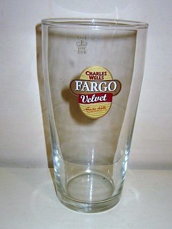 beer glass from the Charles Wells brewery in England with the inscription 'Fargo Velvet Charles Wells'
