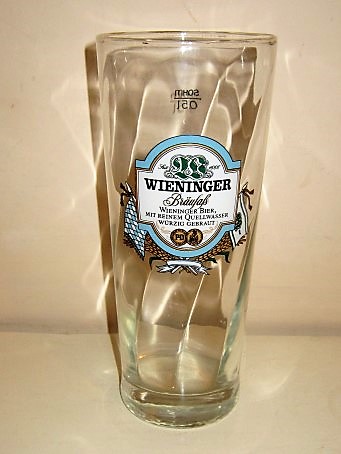 beer glass from the MC Wieninger brewery in Germany with the inscription 'Wieninger, WieningerBier Mit Reinem Quellwasser Wurzig Gebraut'