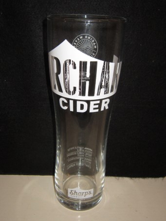 beer glass from the Sharp's brewery in England with the inscription 'Orchard Cider Sharps Brewery Established 1994'
