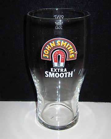 beer glass from the John Smith's brewery in England with the inscription 'John Smith's Estb 1758 Extra Smooth Bitter'