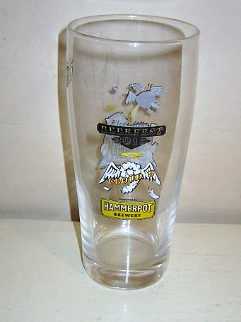 beer glass from the Hammerpot  brewery in England with the inscription 'Fleet Lions Beerfest Cloud 9 Sponsord By Hammerpot Brewery'