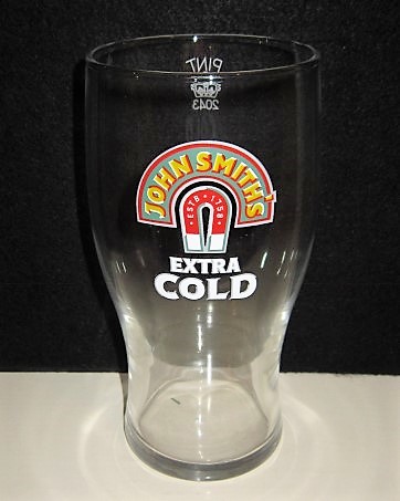 beer glass from the John Smith's brewery in England with the inscription 'John Smith's Estb 1758 Extra Cold'
