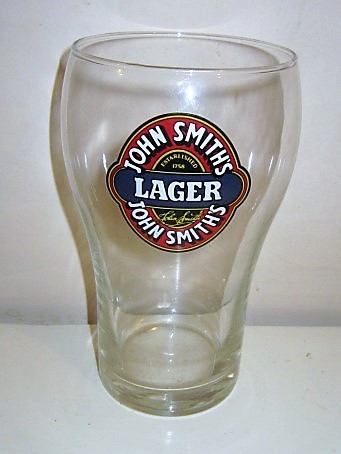beer glass from the John Smith's brewery in England with the inscription 'John Smiths Lager, John Smiths Established 1758'
