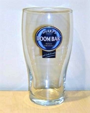 beer glass from the Sharp's brewery in England with the inscription 'Sharp's Doom bar Rock Cornwall '