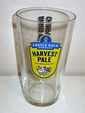 beer glass from the Castle Rock brewery in England with the inscription 'Castle Rock Brewery Harvest Ale, The Finest Blond Beer'