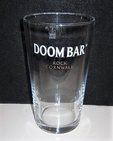 beer glass from the Sharp's brewery in England with the inscription 'Doom bar Rock Cornwall'