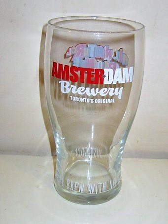 beer glass from the Amsterdam  brewery in Canada with the inscription 'Amsterdam Brewery Toronto's Original, A Local Brew With No Extra Stuff Just Good Taste'