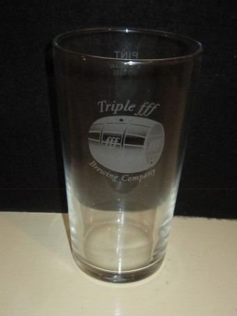 beer glass from the Triple FFF brewery in England with the inscription 'Triple FFF Brewing Company'