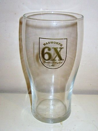 beer glass from the Wadworth brewery in England with the inscription 'Wadworth 6X Traditional English Ale'