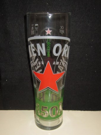 beer glass from the Heineken brewery in Netherlands with the inscription 'Heineken Original, Diplome D'Hnneur Amsterdam EN 1883 EST1873 He150ken'