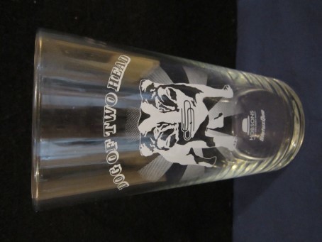 beer glass from the Hobsons brewery in England with the inscription 'Dog Of Two Head Hobsons Brewery Status Quo '