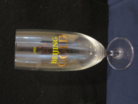 beer glass from the Kirin brewery in China with the inscription 'Beijing Gold'