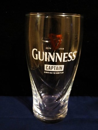 beer glass from the Guinness  brewery in Ireland with the inscription 'Guinness ESTD 1759 Captain Always Has The Game Plan'