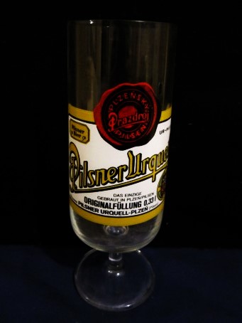 beer glass from the Pilsner Urquell brewery in Czech Republic with the inscription 'Pilsner Urquell Originalfullung 0.33L Pilsner Urquell Plzen'