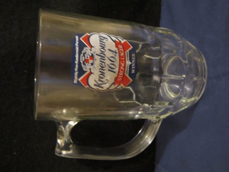 beer glass from the Kronenbourg brewery in France with the inscription 'Kronenbourg 1664 Strong Lager Winner, Slightly Non - Konformist Pursuit'