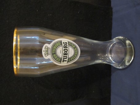 beer glass from the Tuborg brewery in Denmark with the inscription 'Tuborg Gron Tuborg Pilsner Ol Brygget Siden 1880 Hele Danmarks Pilsner'