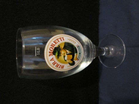 beer glass from the Moretti brewery in Italy with the inscription 'Birra Moretti Dal 1859 Qualita E Tradizione'