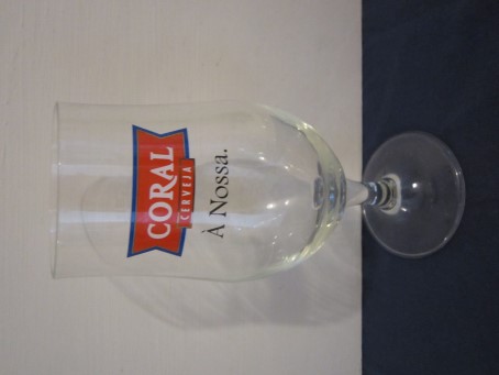 beer glass from the Empresa De Cervejas Da Madeira brewery in Portugal with the inscription 'Coral Cerveva A nossa'