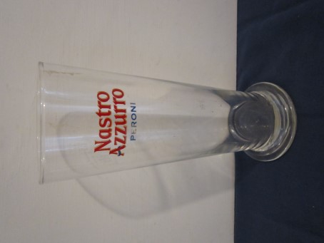 beer glass from the Peroni brewery in Italy with the inscription 'Nastro Azzurro Peroni'