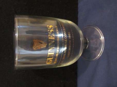 beer glass from the Guinness  brewery in Ireland with the inscription 'Guinness 50 Years Of Brewing Genius, L.V.N.H. 20th Annual Convention Brighton 1986'