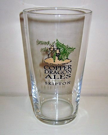 beer glass from the Copper Dragon  brewery in England with the inscription 'Copper Dragon Ales Skipton'