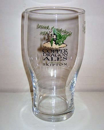 beer glass from the Copper Dragon  brewery in England with the inscription 'Copper Dragon Ales Skipton'