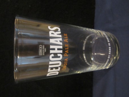 beer glass from the Caledonian  brewery in Scotland with the inscription 'Deuchars Brewed By Hand In Scotland'