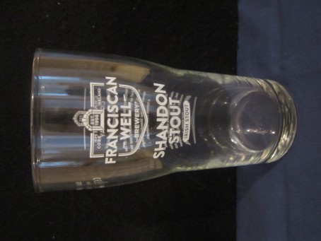 beer glass from the Franciscan Well brewery in Ireland with the inscription 'Franciscan Well Brewery Cork Ireland EST 1998'