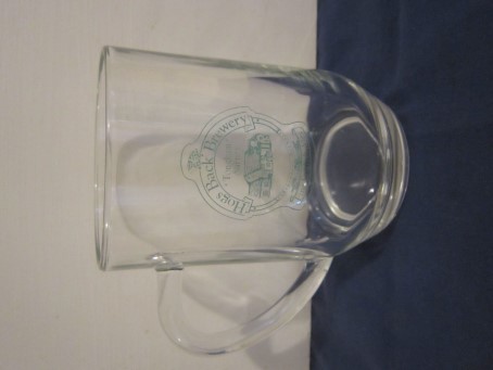 beer glass from the Hogs Back brewery in England with the inscription 'Hogs Back Brewery Tongham Surrey Fine English Ale'