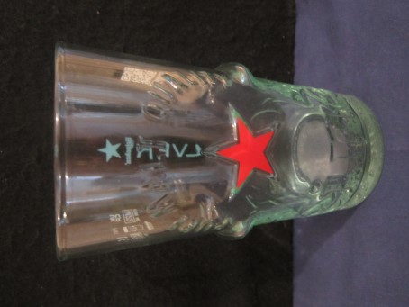 beer glass from the Heineken brewery in Netherlands with the inscription 'Heineken Pure Malt Quality'