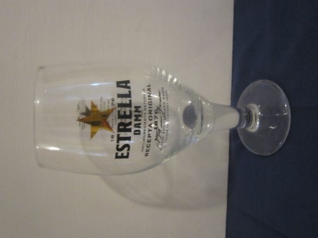 beer glass from the Damm brewery in Spain with the inscription '1876 Estrella Damm Recepta Original 1876'