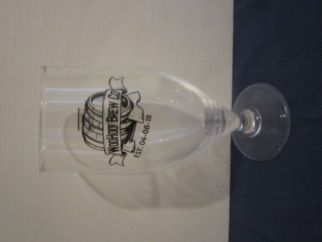 beer glass from the WooHoo brewery in England with the inscription 'WooHoo! Brew Co EST 04-08-18'