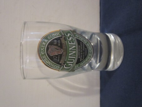 beer glass from the Guinness  brewery in Ireland with the inscription 'Guinness Extra Stout 1759 Dudlin Ireland Guinness St James's Gate Dublin'