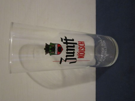 beer glass from the Erzquell Biestein brewery in Germany with the inscription 'Zunft Kolsch, Dep Zunftige Schluck Aus Bielstein'